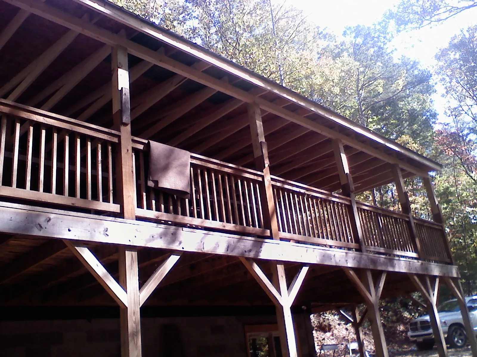 Timber framing under a new elevated porch and deck — Roof Leak Repair in Kalamazoo by Roofing Brothers